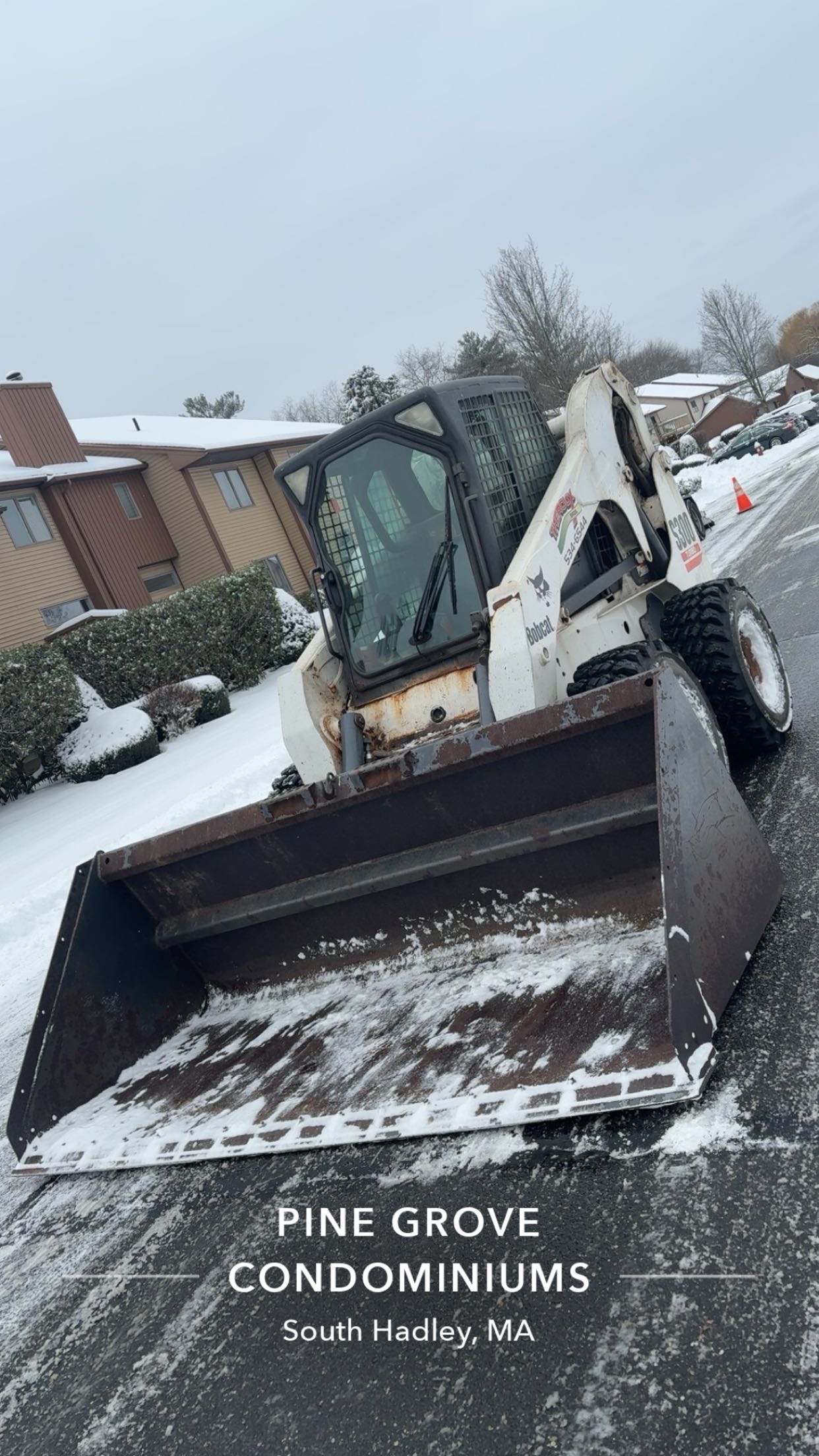 Bobcat equipment working in snowy site conditions